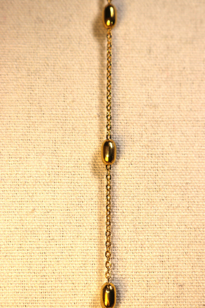 Bracelet - chaîne boule ovale dorée