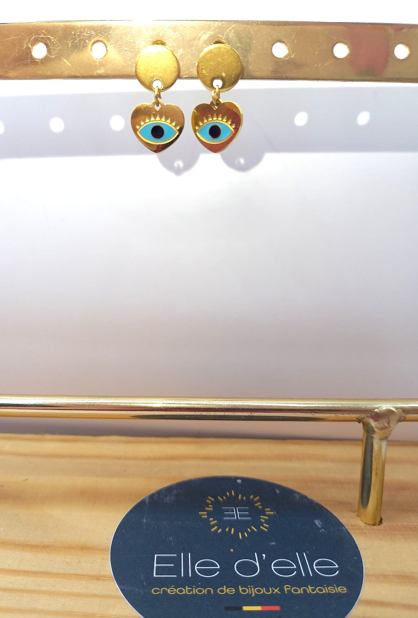 Boucle d'oreille - oeil bleu coeur