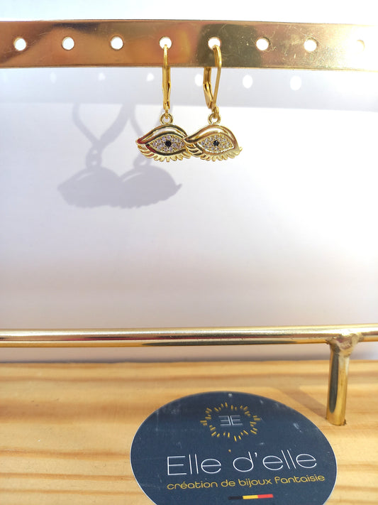 Boucle d'oreille - oeil brillant